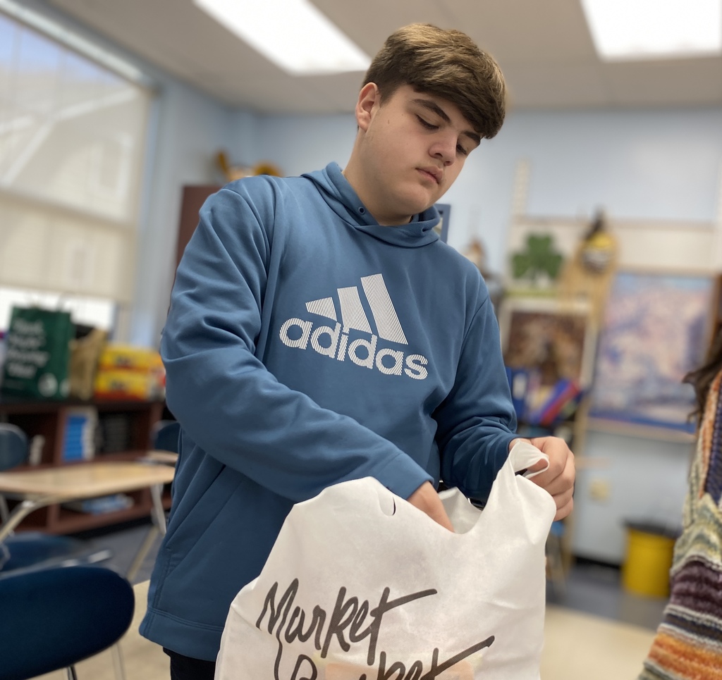 student with food donations